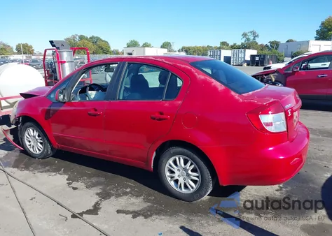 2013 Suzuki Sx4 Le/Le Popular z USA, uszkodzony, nr VIN JS2YC5A36D6100855